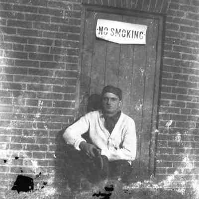 Man & brick building