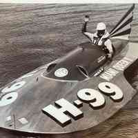          Louise Nuta waves in Victory after drivind Miami Queen II at 122 MPH during Orange Bowl Regatta speed trials.
   