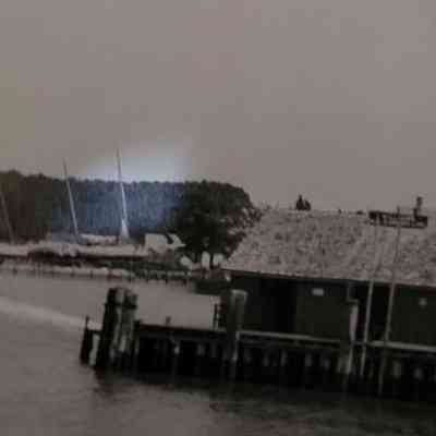 Showing the wharf and its surroundings. Circa 1900.