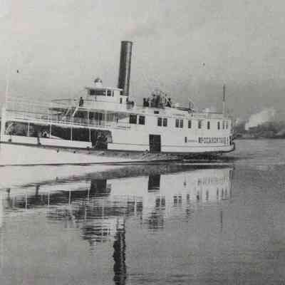 Oblique angle, medium shot of port bow and side.
