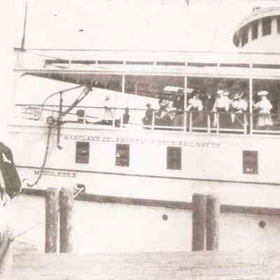 Port side of bow at wharf.