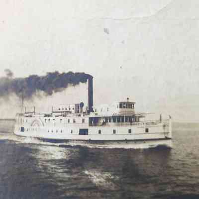 Quarter, long distance shot of starboardside.