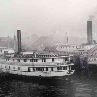 Oblique angle, closeup shot. Unidentified steamer on left and Virginia (1903) on right.