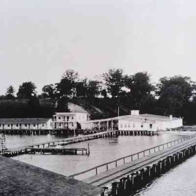White Stone Beach Hotel. Long shot appears to be taken from a steamer at wharf.