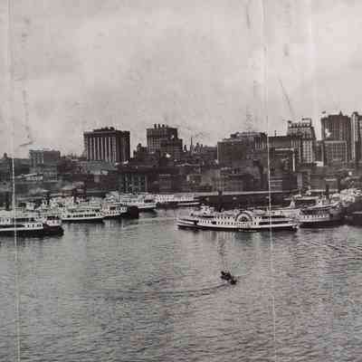 Oblique angle, long shot.: Steamers in order from left to right: Piankatank, Cambridge, Westmoreland, Avalon, Old Point Comfort, Anne Arundel, Calvert, Three Rivers, Middlesex, Anthony Groves, Jr., Maryland, Eastern Shore, Tivoli, and Annapolis.