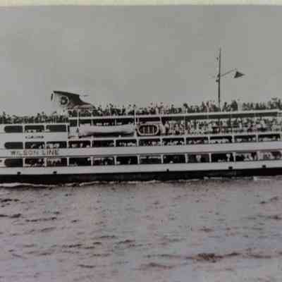 Bay Belle filled with passengers.: Black and white photograph showing the port side underway.