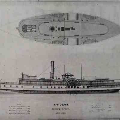 Photograph of top side view blueprint.