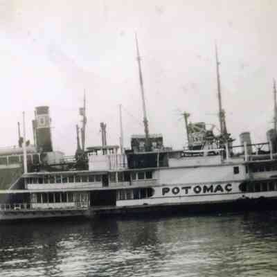 Straight angle, medium shot of port awaiting demolition.