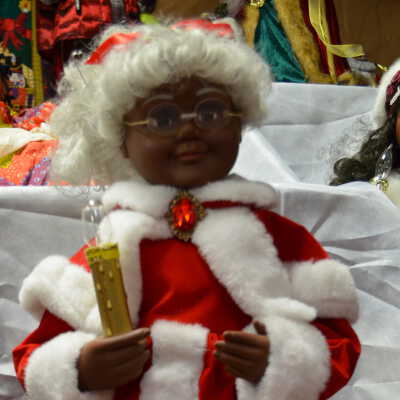 Mrs. Santa with light up candle