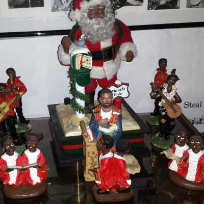 Santa with musical choir and guitar playing figurines (not a collection)