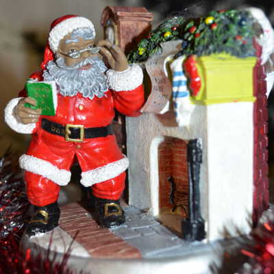 Santa checking names at chimney