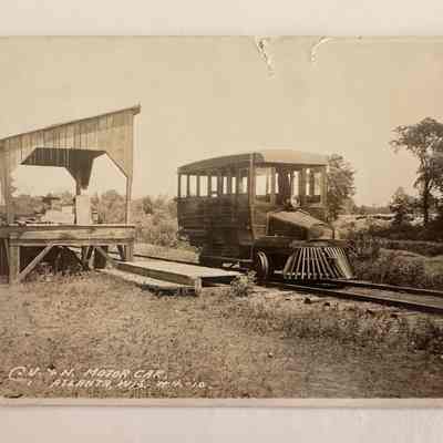 Chippewa Valley Northern Stover Motor Railbus In Atlanta Wisconsin: The CV & N ran passenger service on the line from 1908 to 1909.  In 1900 the Arpin Hardwood Lumber Company built a new mill at Atlanta on Mad Brook (now Devil's Creek) one and one-half miles north of
Bruce and built 18 miles of logging railway that ultimately ran north into Sawyer County.