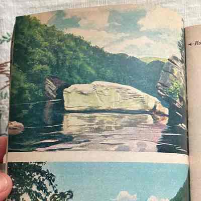 Page 22: Illustrations: Top: boulders rising out of forested lake, country cottage by the sea