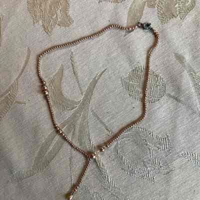 Faux gold colored, seed pearl necklace