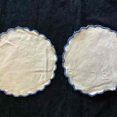 2 Scalloped edged cotton rounds