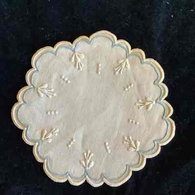 Blue and white embroidered coaster