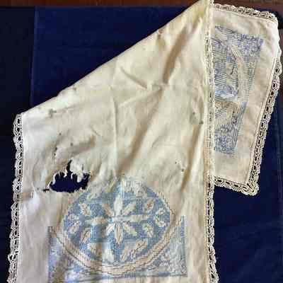 Unfinished embroidered textile