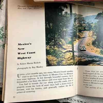 Pages 32-33, "Mexico's New West Coast Highway": portion of article by Robert Martin Hodesh with photo of car driving away on a road by Ray Manley