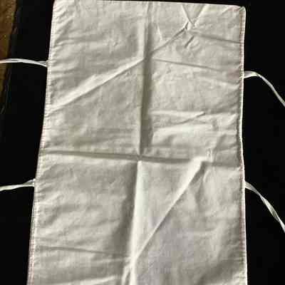 White pouch with 4 ties