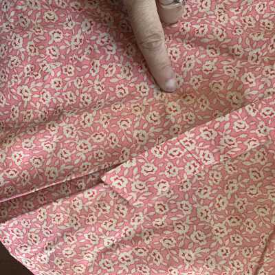 Stain: Yellow stain undetermined type on front of dress on lower portion.