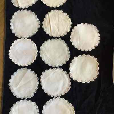 12 coasters/cotton doilies