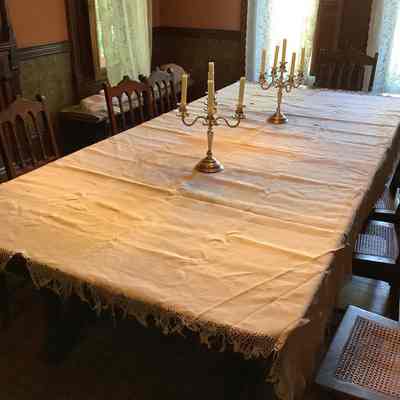 Large white table cloth with damask design