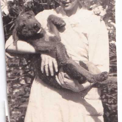 Emelita 1920s(?) with unknown dog.