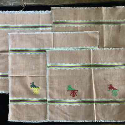 Four bird embroidery linens