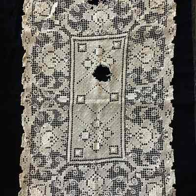 Woven textile with holes