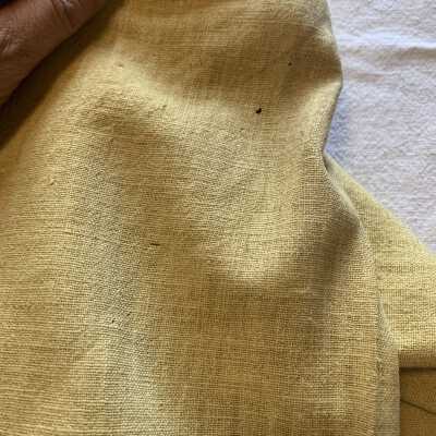 Left sleeve: Moth damage