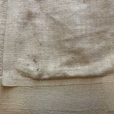 Left front pocket: Brown spots