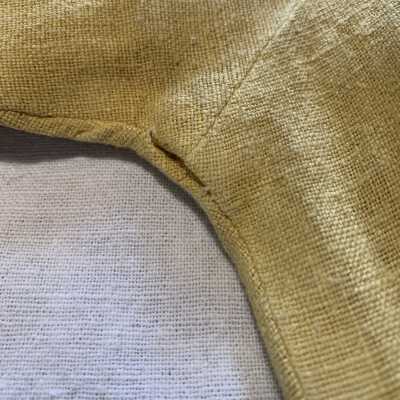 Right under arm: Seam separation