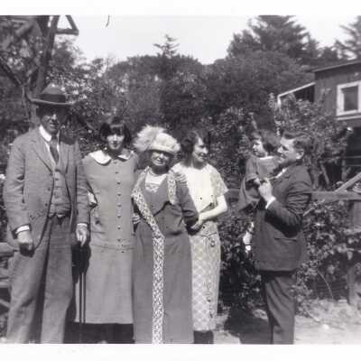 Spring 1924. The garden at 1440 29th Ave, Alfred H, Emma, Marion, Nancy, and Bill Gilliland (front of picture).