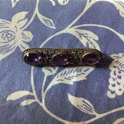 Silver and amethyst brooch