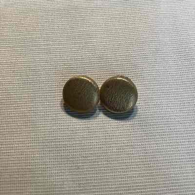 Pair of gold colored, circle, clip back earrings.