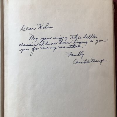 Cursive note on blank page after cover