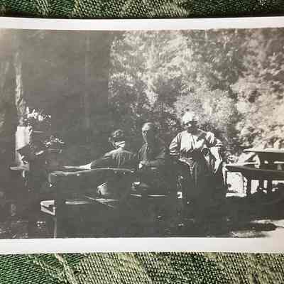 Picture of 3 individuals at Cohen Camp