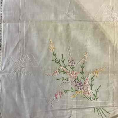 Finely embroidered flower textile