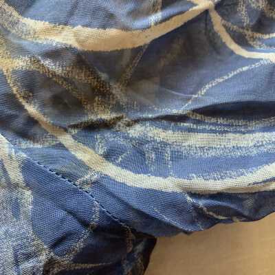 Staining: Under arm possible sweat stains