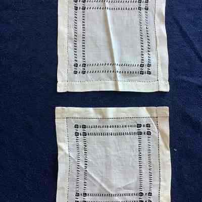 Two small square textiles
