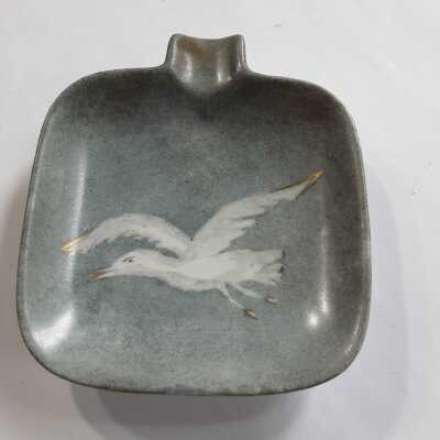 Ash-tray with bird