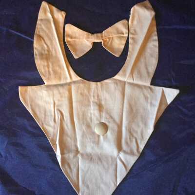 Pink bib collar, matching bow and fabric-covered button