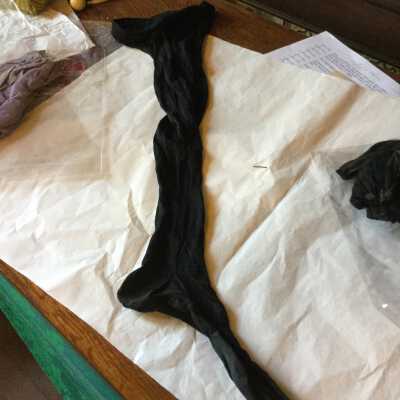 Stocking plain black. Nylon?