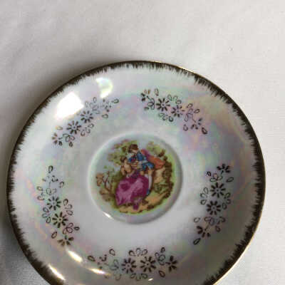 Saucer one of set opalescent. No marking