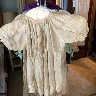 Child’s tunic, White gathered lace trim on neck, sleeves, and hem