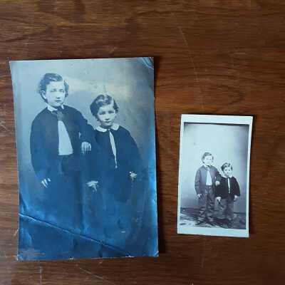 Back of both photos reads: "William + Alfred Henry Cohen": Photo of A.H. (on right) with older brother William (on left) in early 1860s, William born in 1855, A.H. in 1858