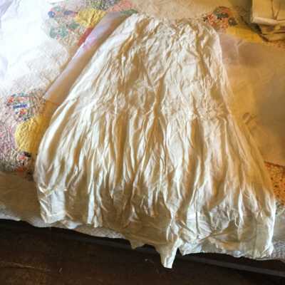 Slip. Embroidered lace