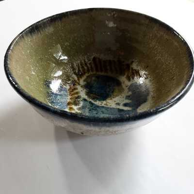 Bowl with blue rim /greenish glaze