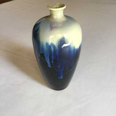 Black, blue, tan Vase