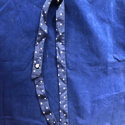 Navy with white dot and single button belt